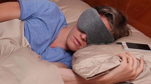 This sleep mask has built-in headphones—and it’s magic