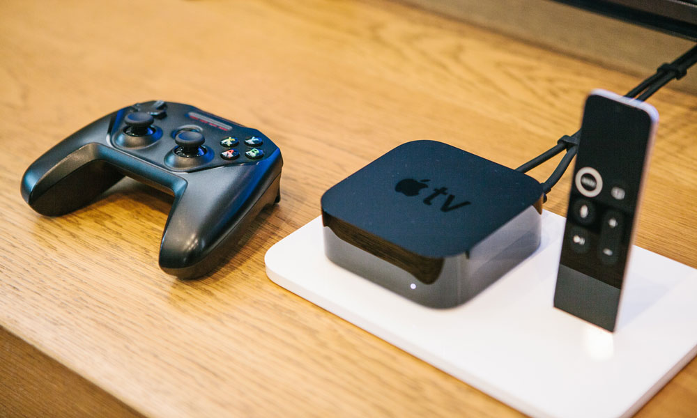 Apple TV with remote and game controller