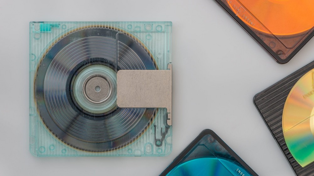 A stack of Mini Disks on a table